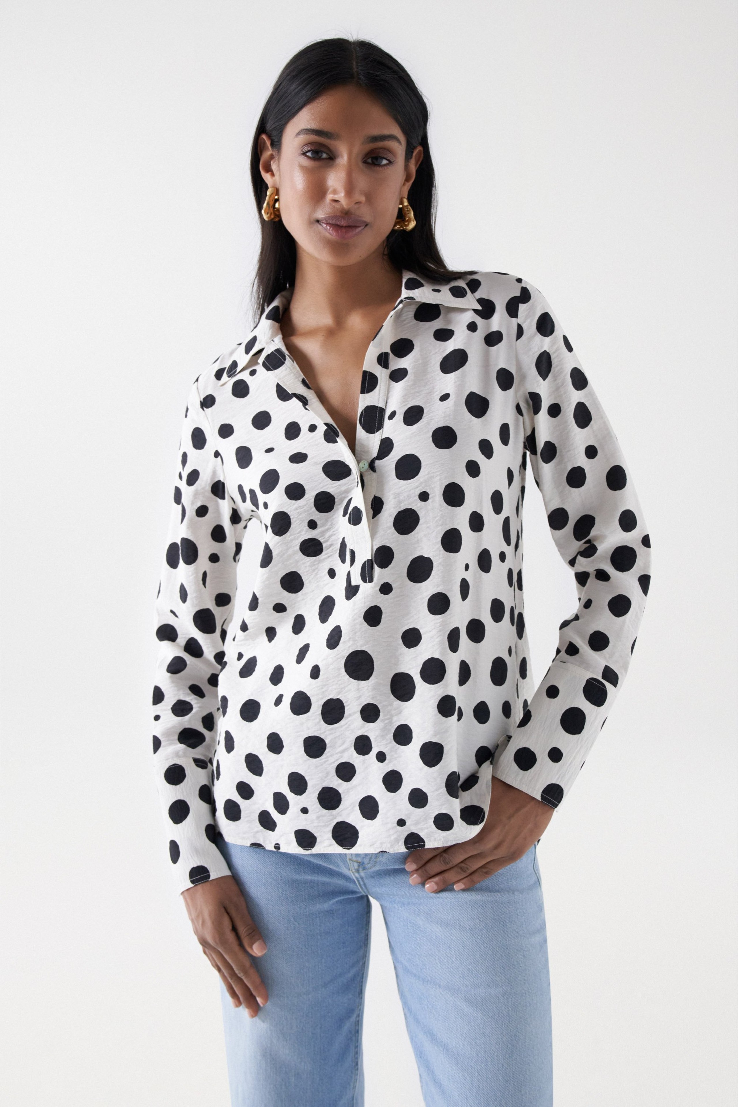 grey polka dot blouse