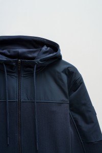 COAT WITH MIXED MATERIALS
