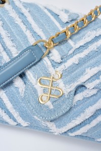 BOLSO VAQUERO CON CADENA