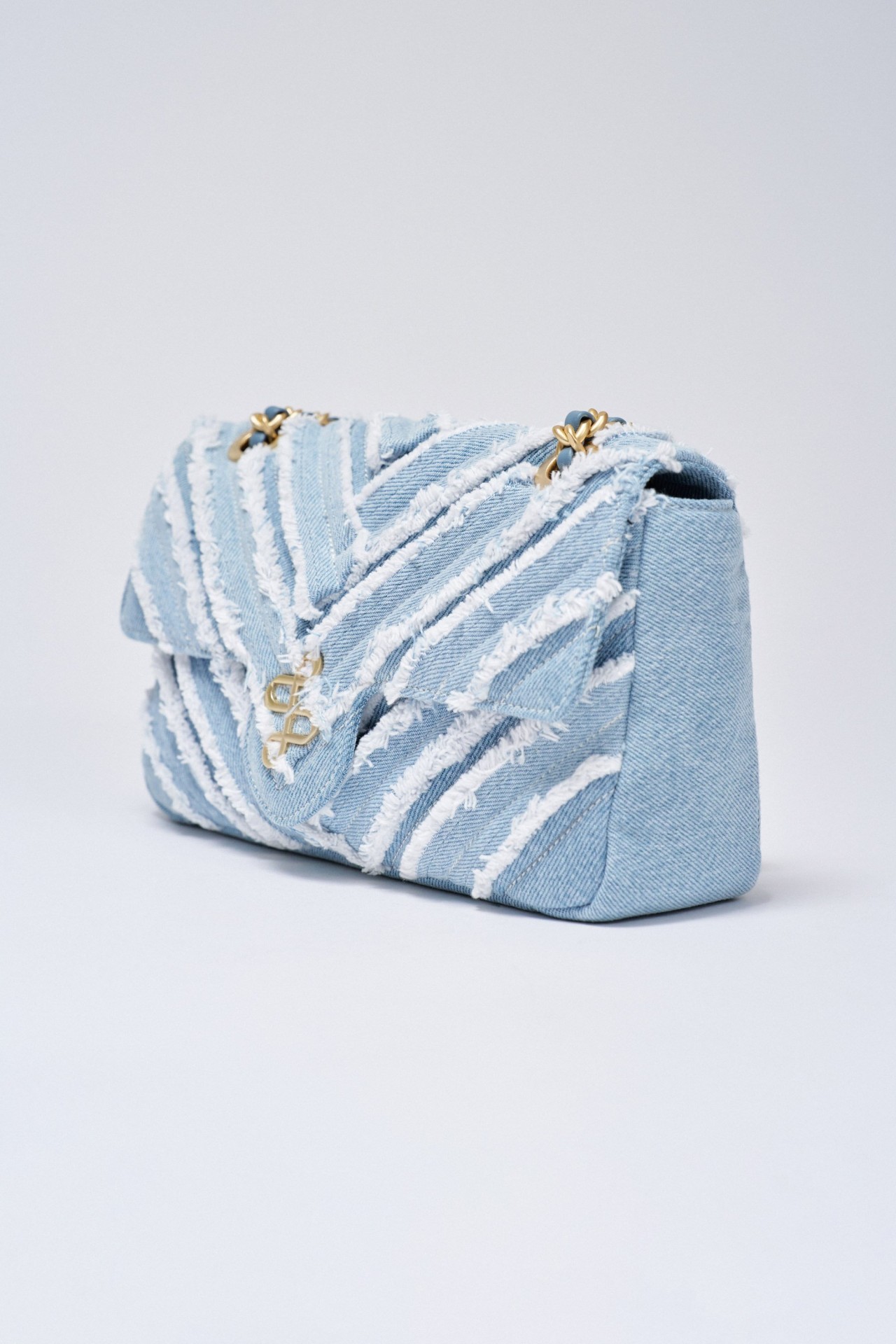 BOLSO VAQUERO CON CADENA
