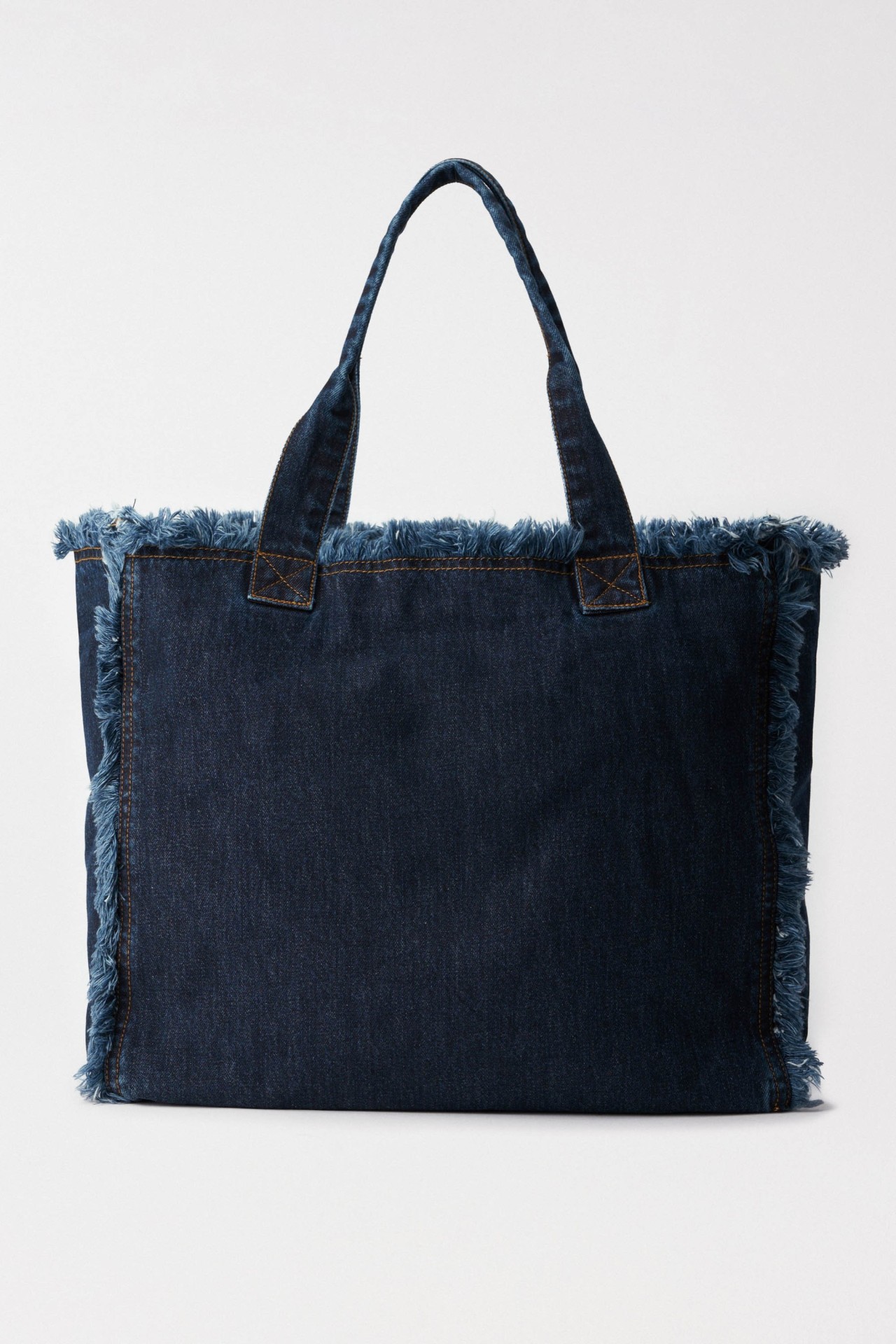 BOLSO DE MANO EN VAQUERA