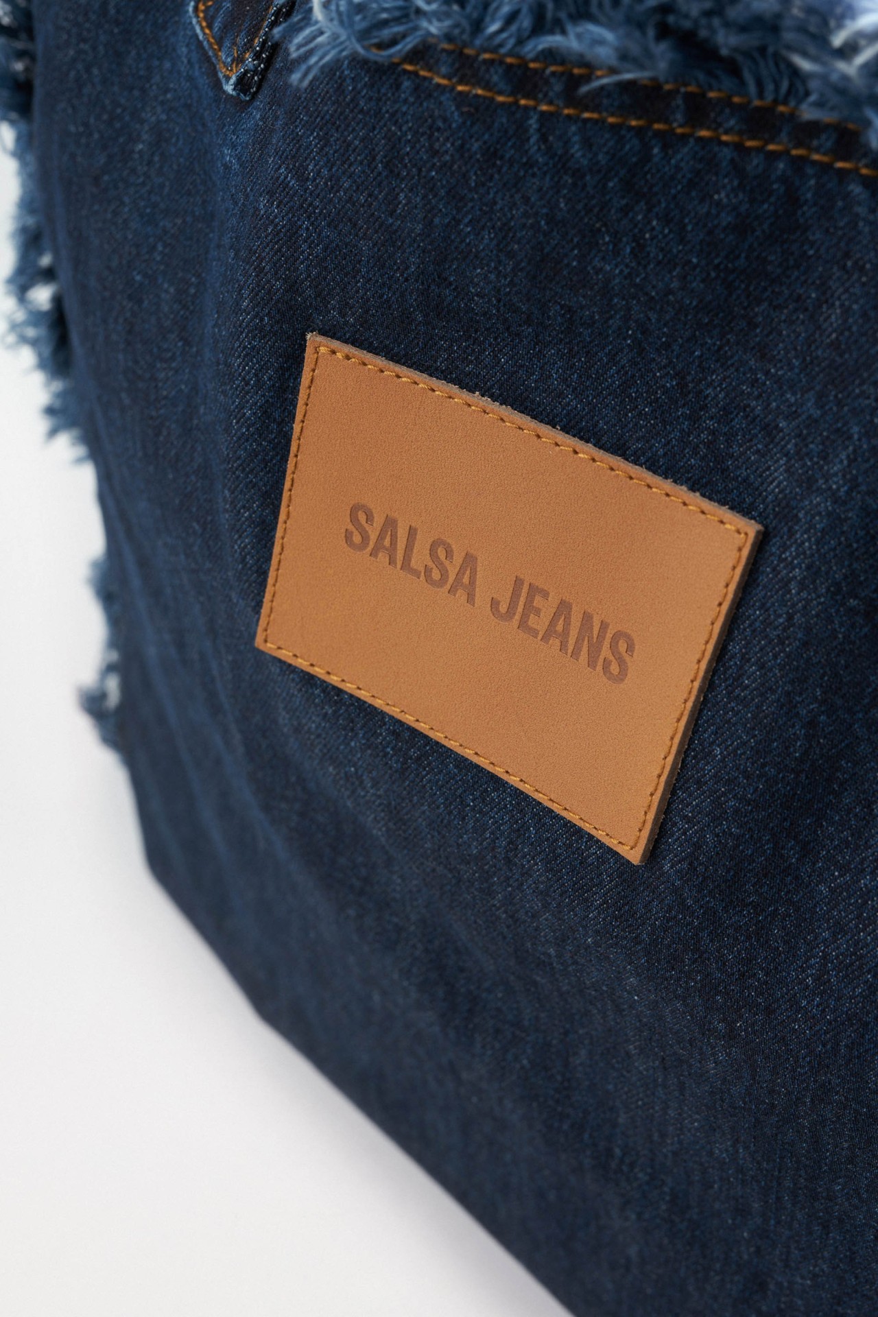 BOLSO DE MANO EN VAQUERA