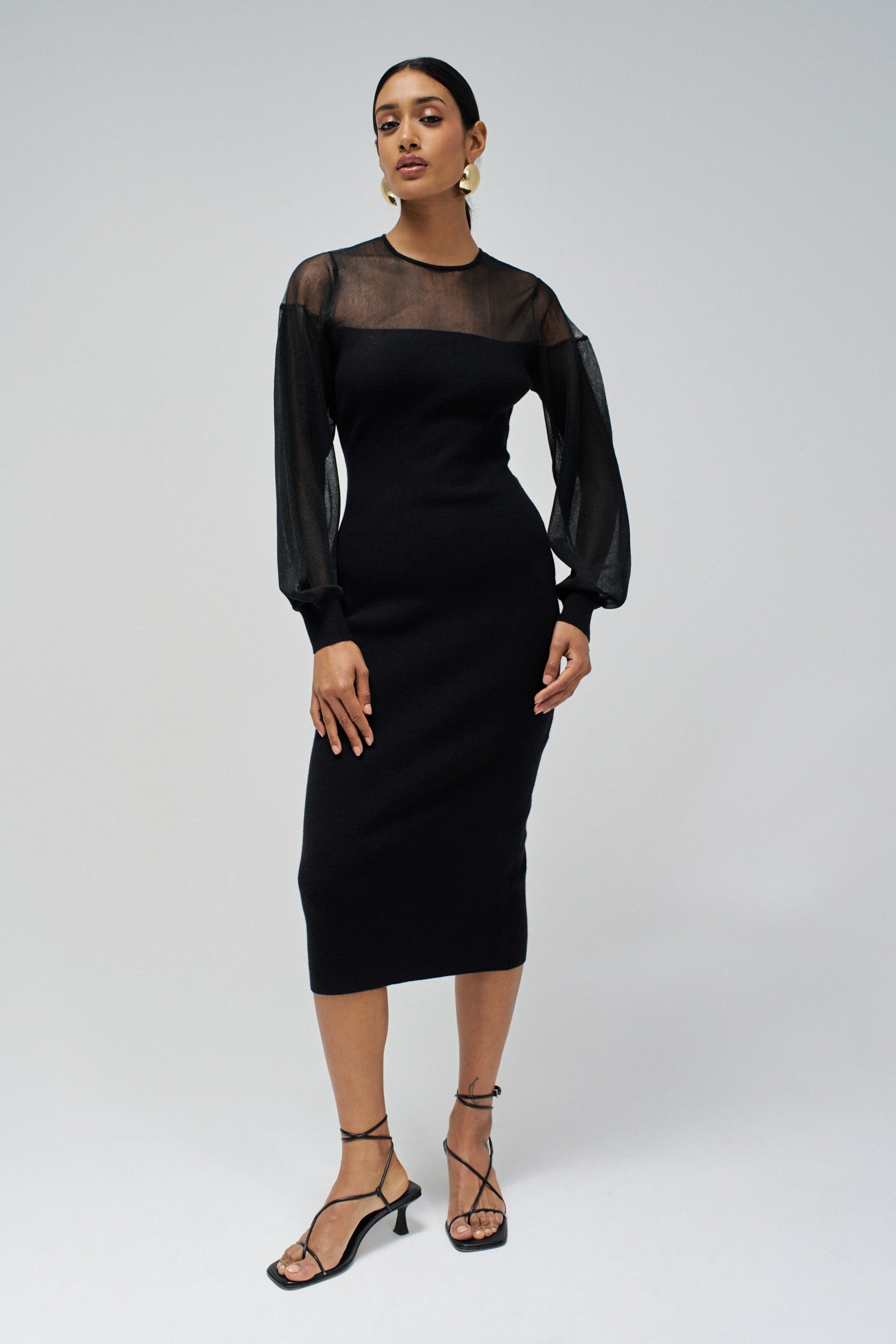 VESTIDO JUSTO DE MALHA COM TRANSPARÊNCIAS