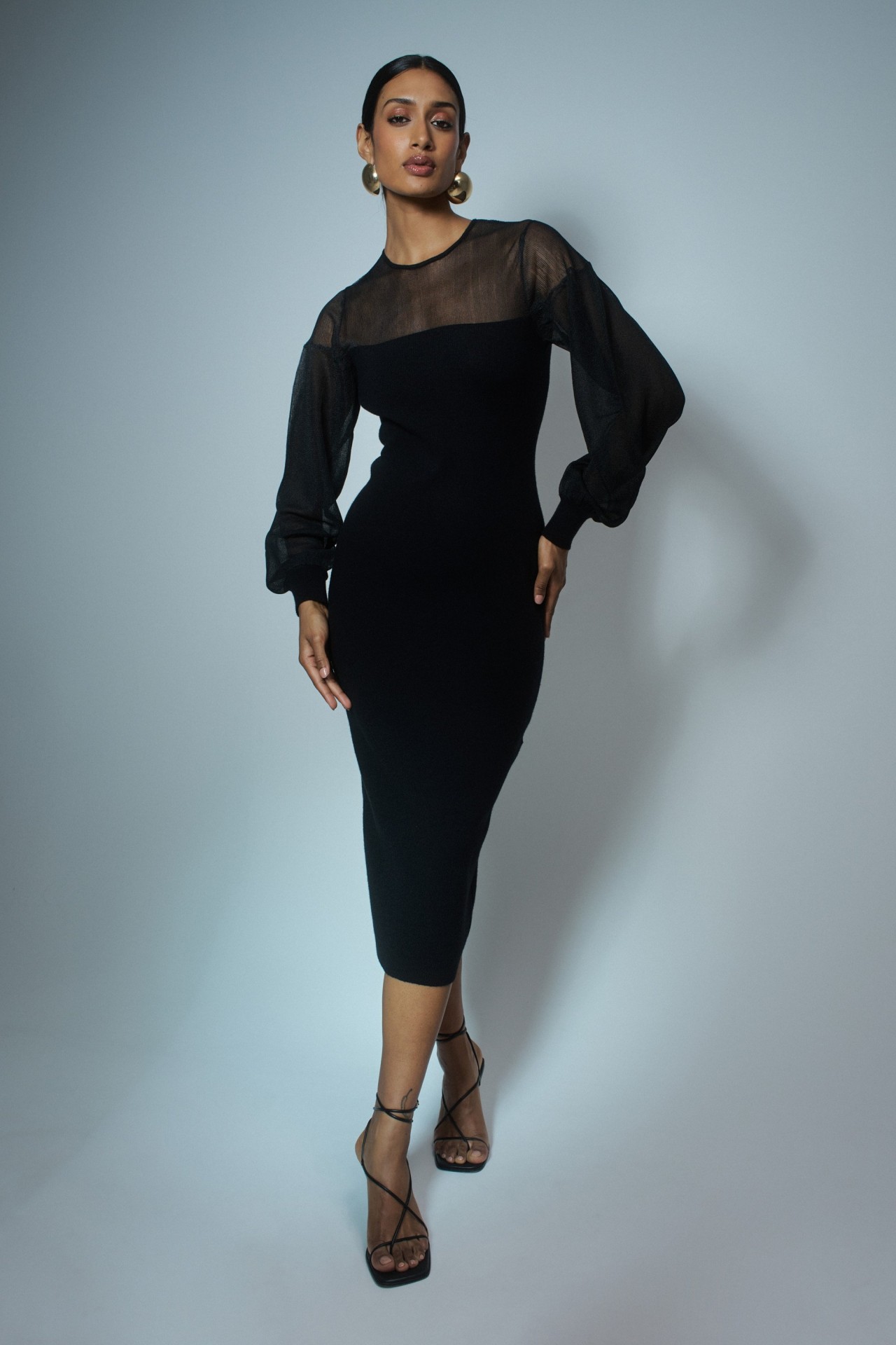 VESTIDO JUSTO DE MALHA COM TRANSPARÊNCIAS