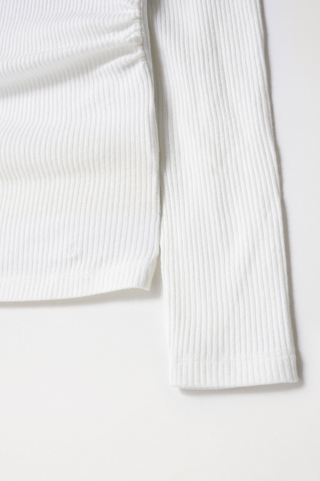 JERSEY DE PUNTO CON APLIQUE