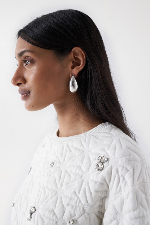 TEXTURED SWEATSHIRT WITH GLITTERY APPLIQUÉS