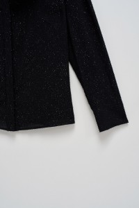 BLUSE MIT VOLANTS