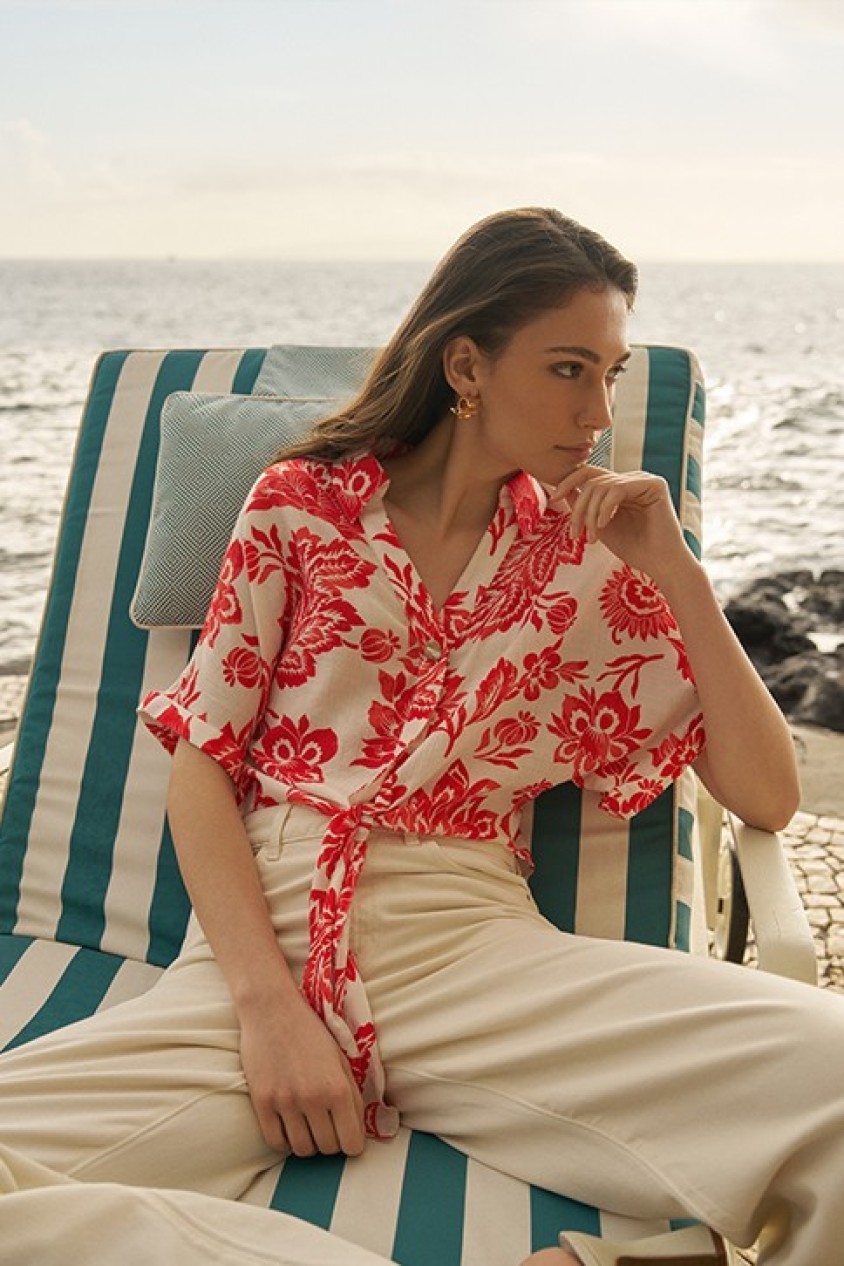 SHIRT WITH BOW AT THE HEM