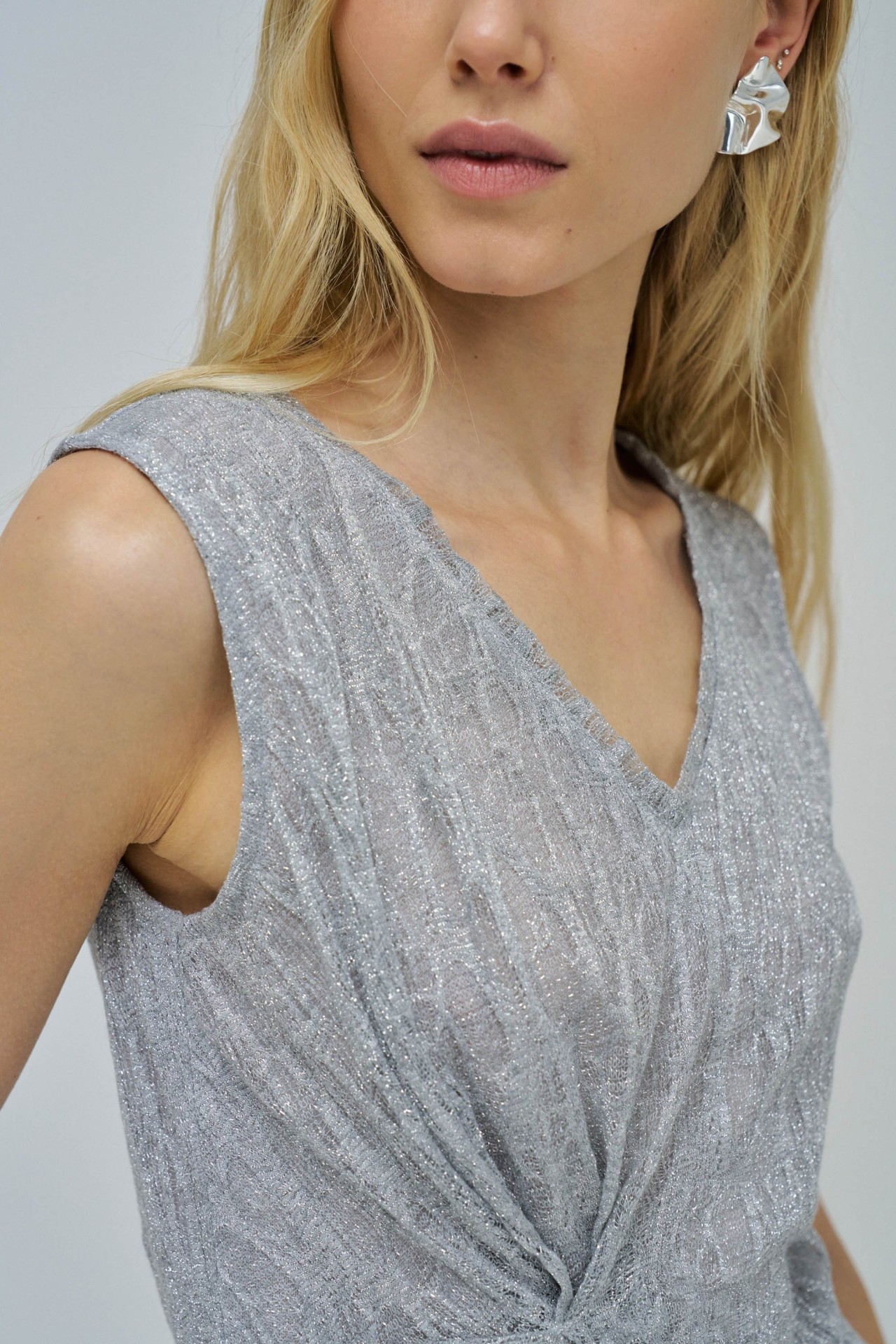 TOP IN STRICK MIT GLANZ