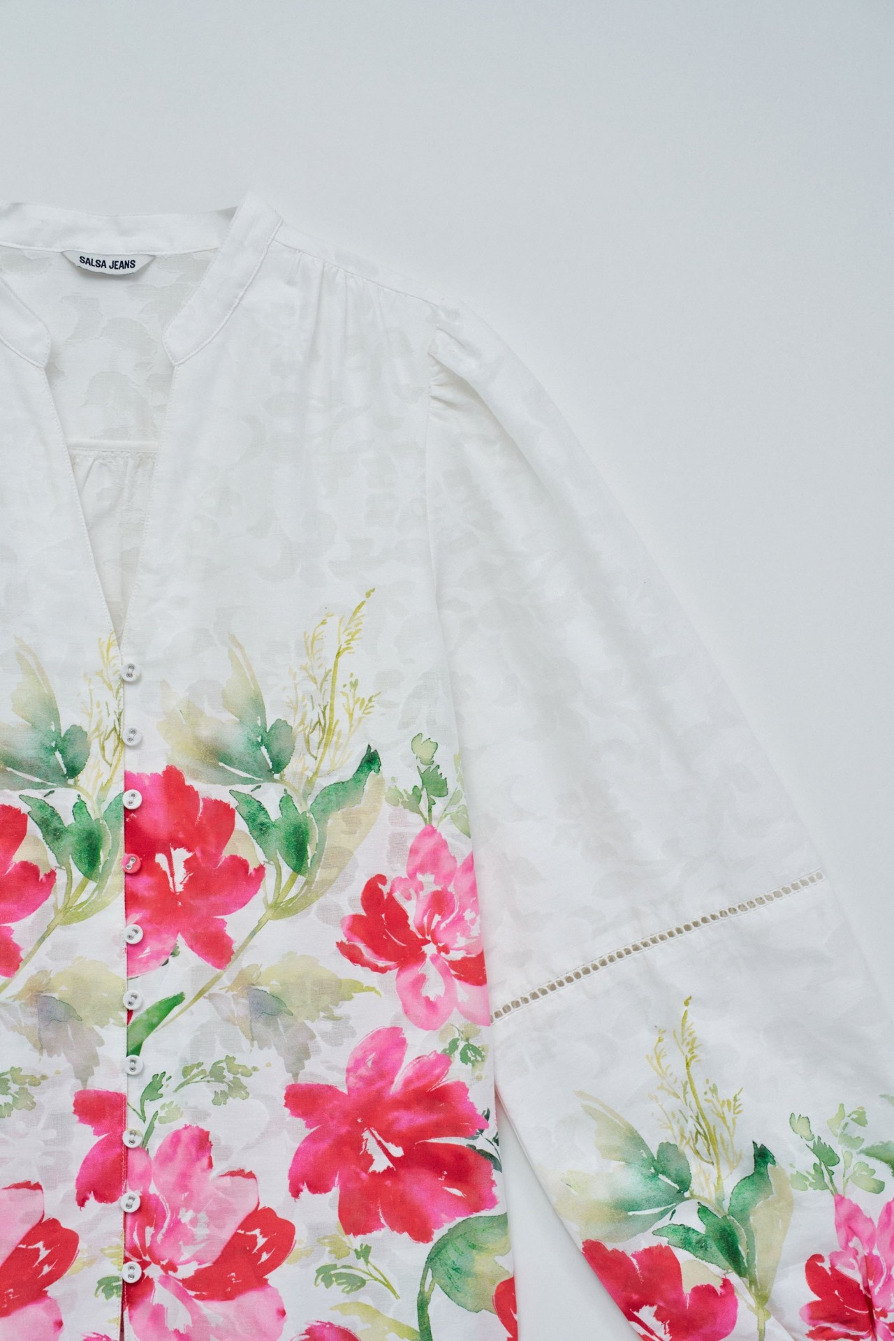 BLUSA JACQUARD CON ESTAMPADO FLORAL