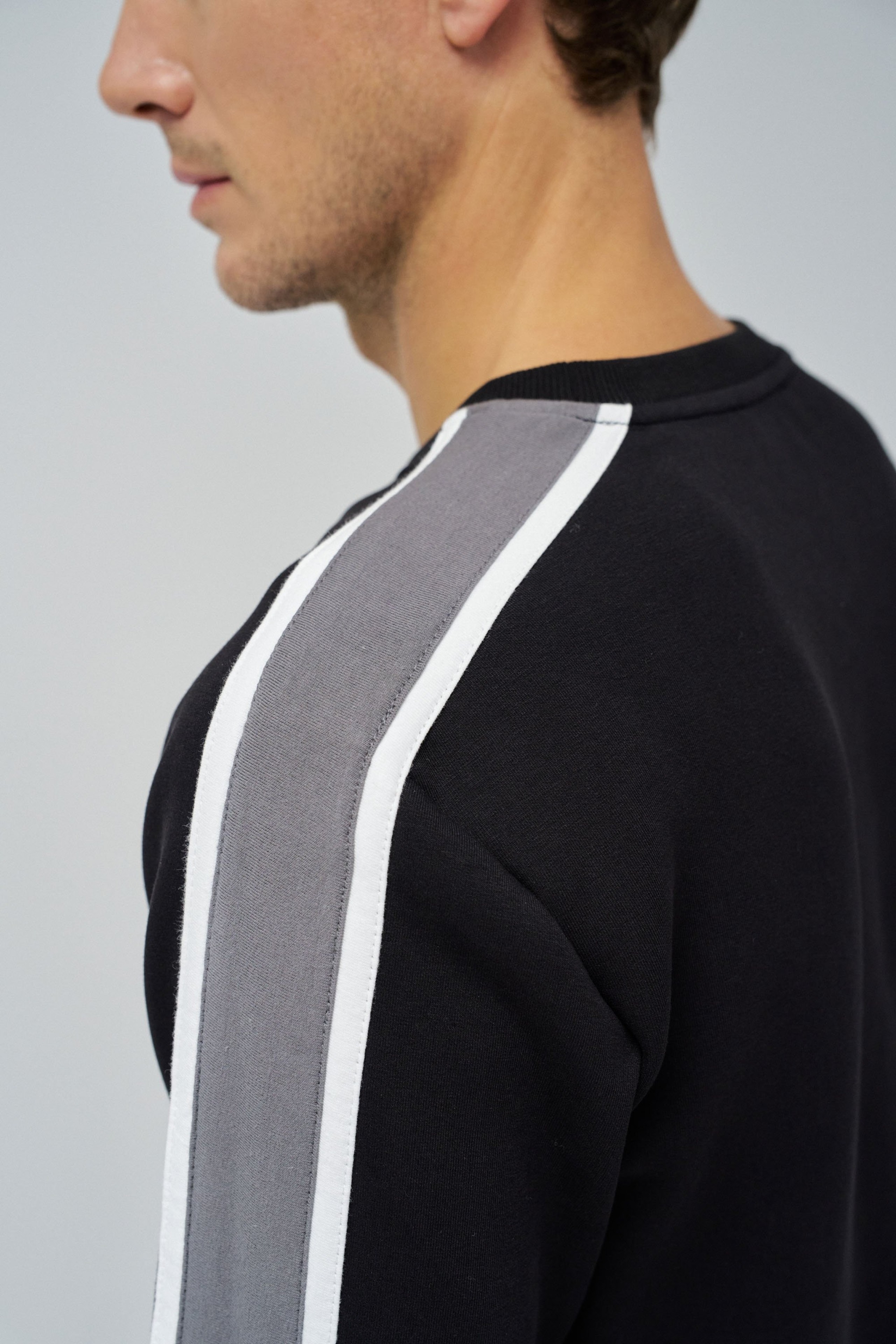 SWEATSHIRT WITH STRIPES ON THE SLEEVES
