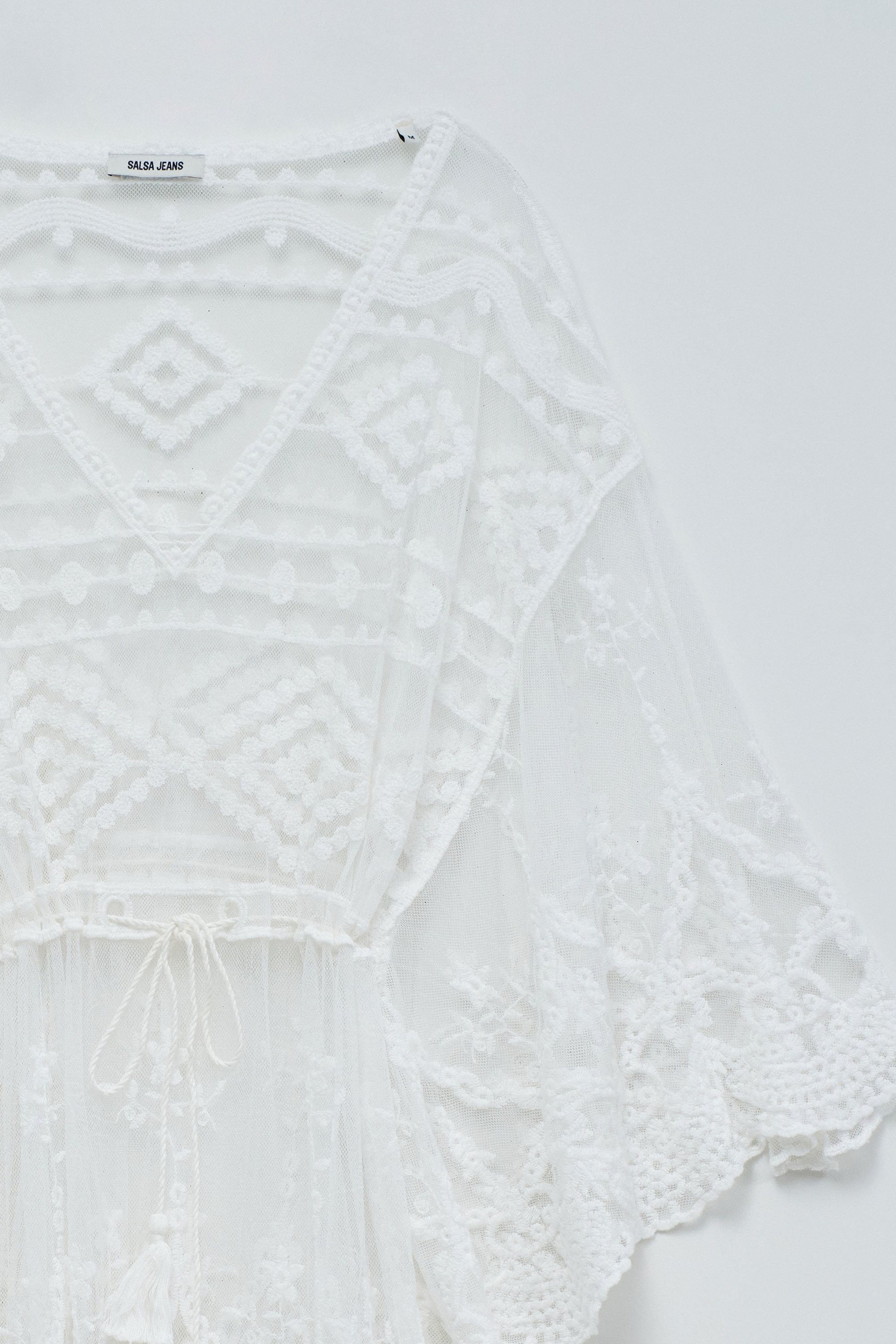 TÚNICA CON TRANSPARENCIA