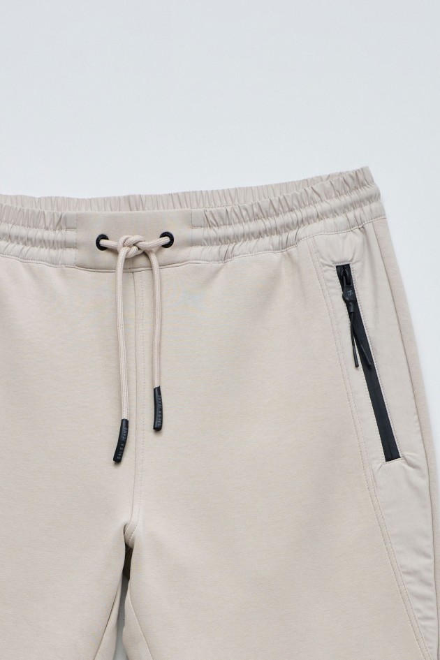 CALÇAS JOGGERS SLIM FIT EM MALHA