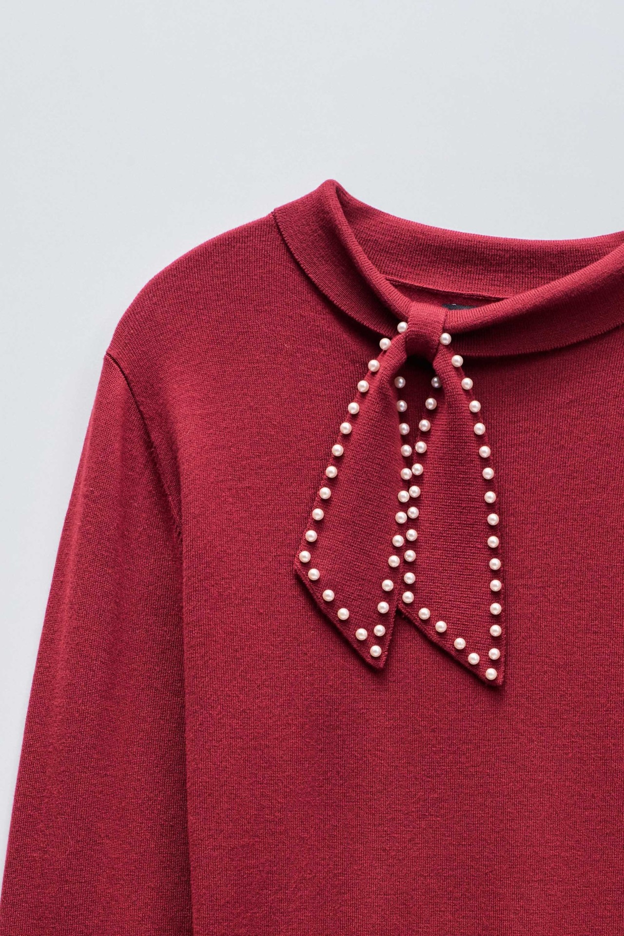 KNIT SWEATER WITH BOW