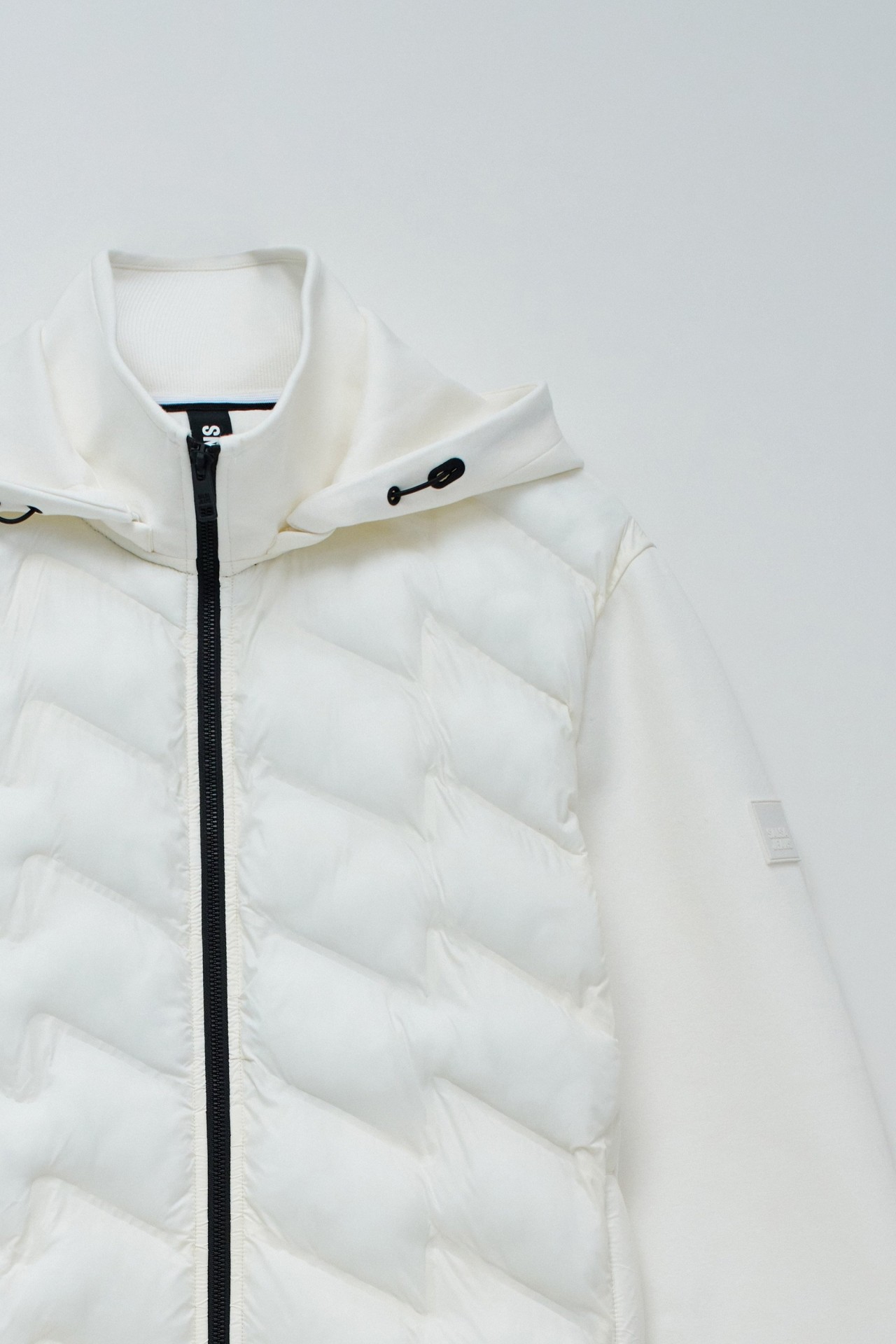 PADDED COAT WITH MIXED MATERIALS