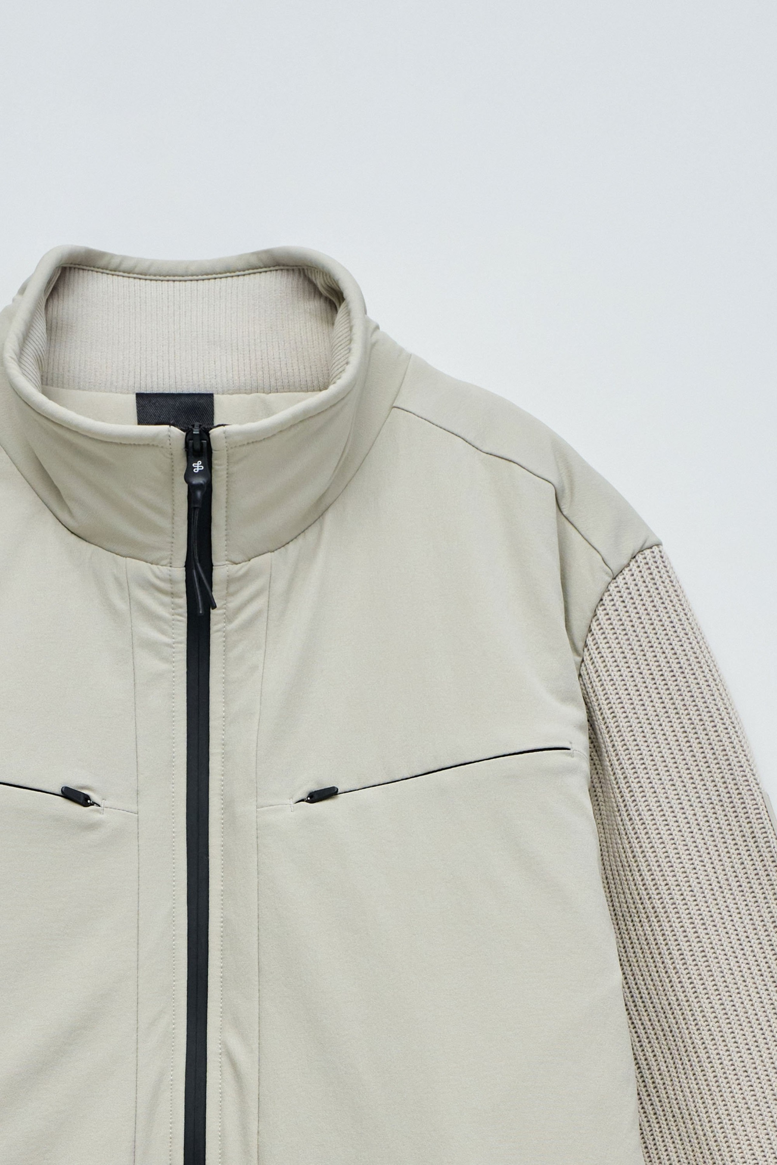 PADDED COAT WITH MIXED MATERIALS