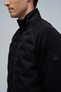 PADDED COAT WITH MIXED MATERIALS