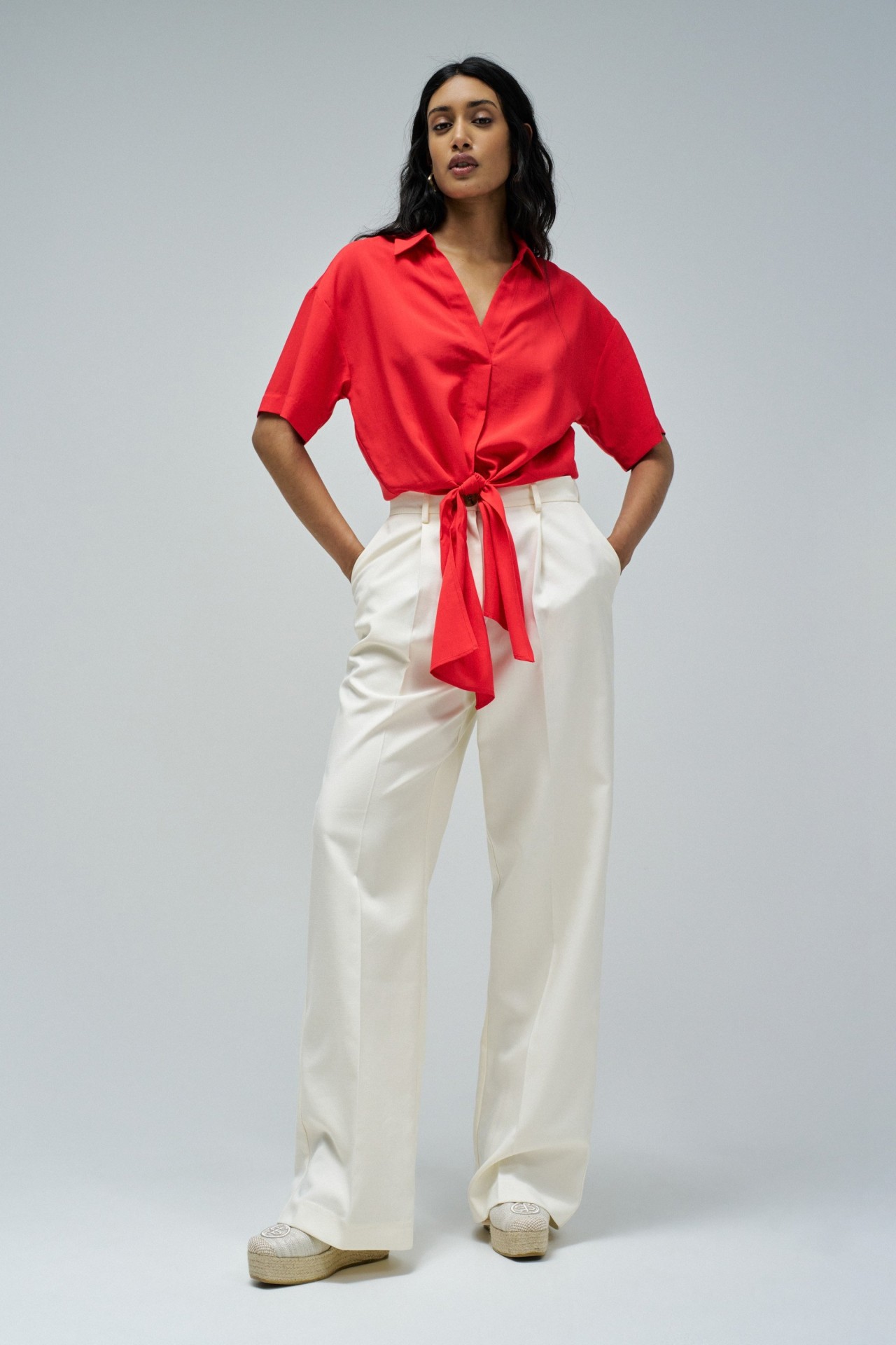 SHIRT IN LIGHTDENIM WITH BOW AT THE HEM