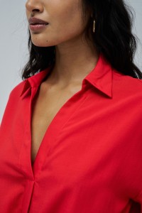 SHIRT IN LIGHTDENIM WITH BOW AT THE HEM