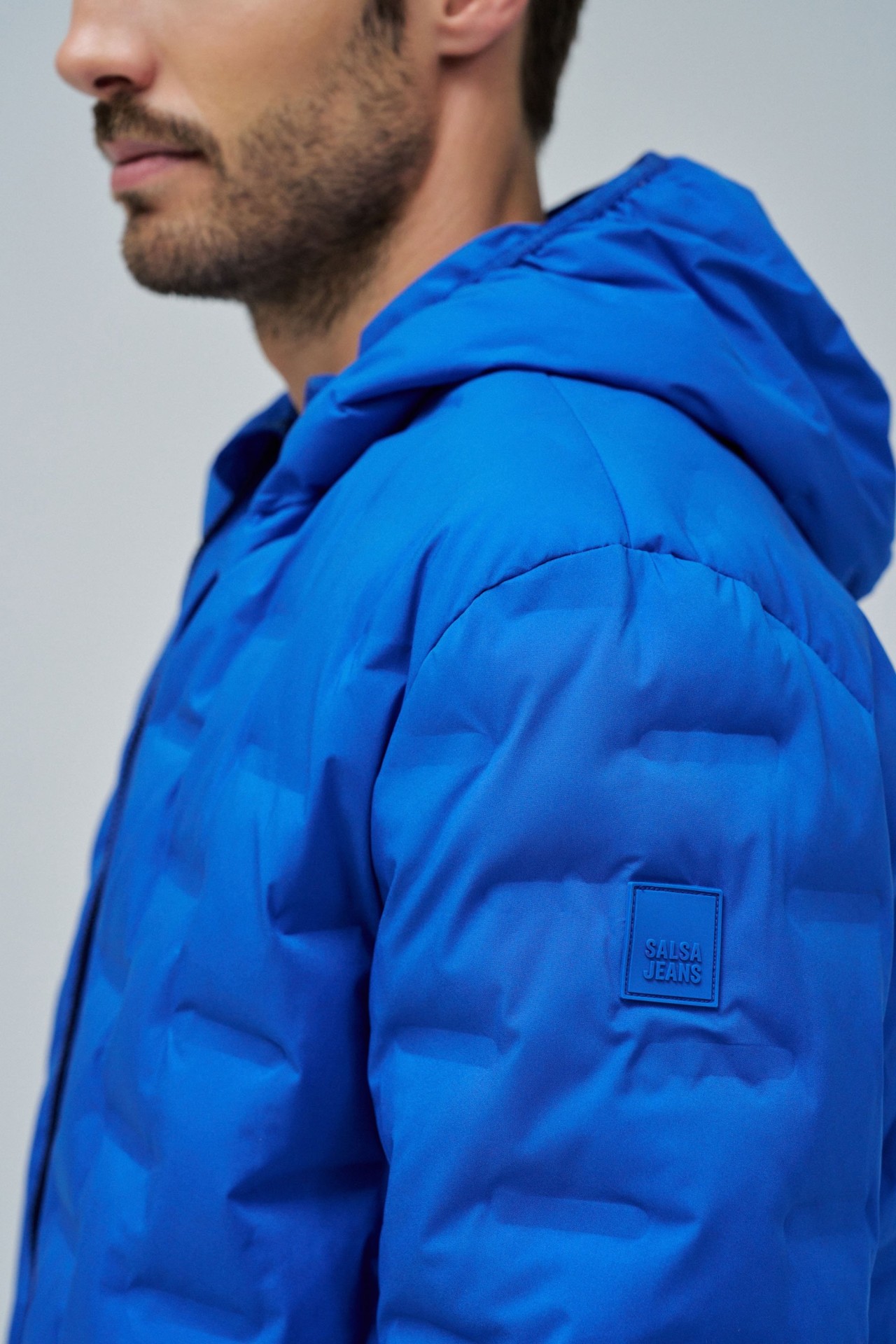 PUFFERMANTEL MIT TASCHEN