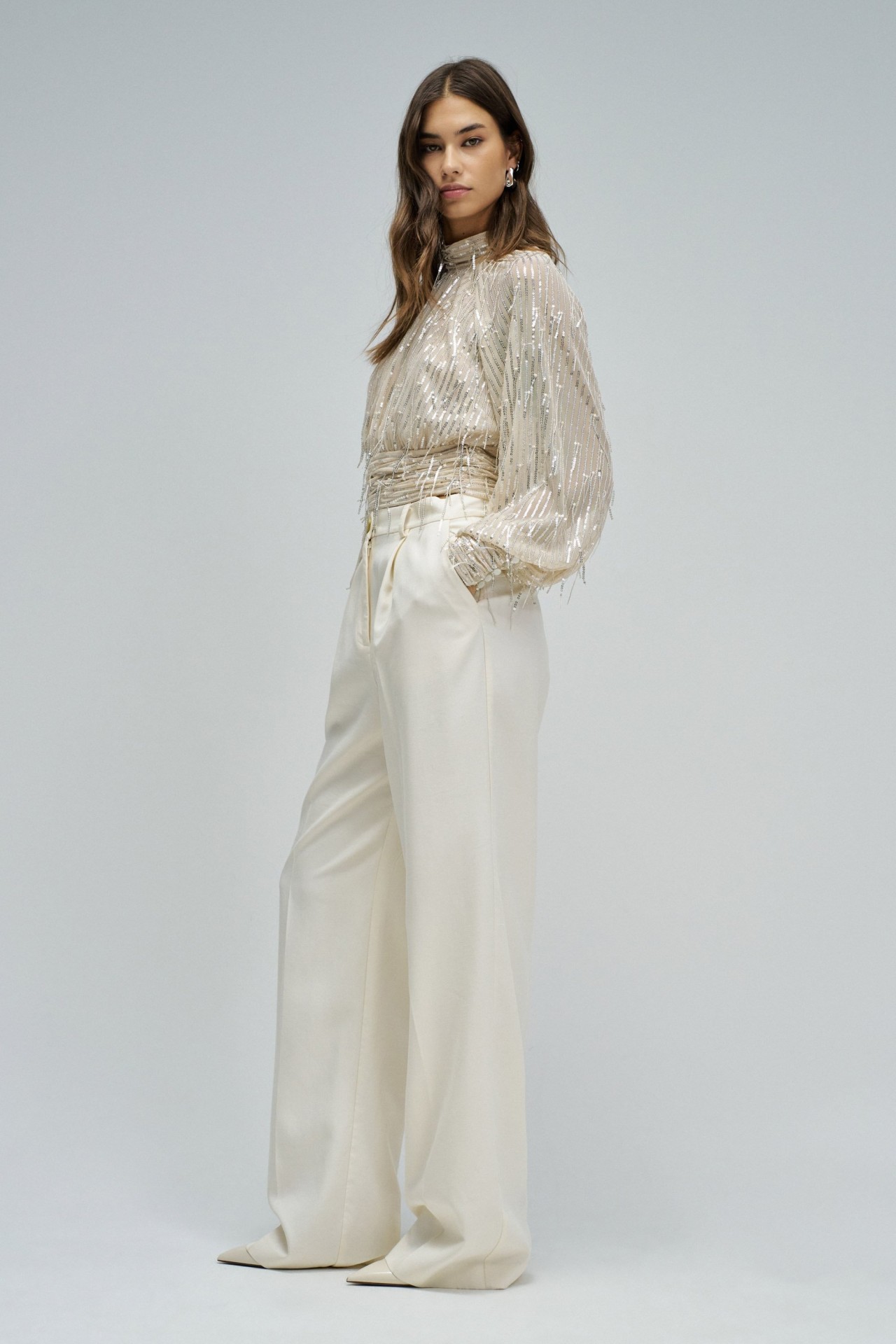 BLUSA CON LENTEJUELAS