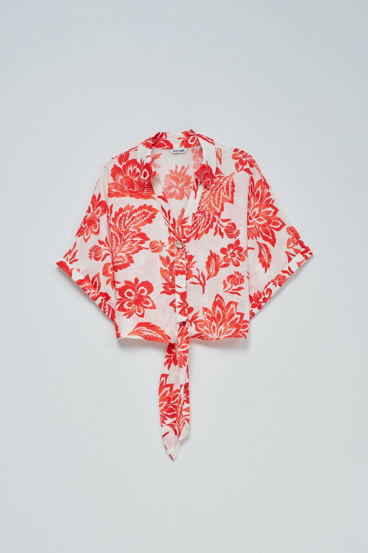 SHIRT WITH BOW AT THE HEM