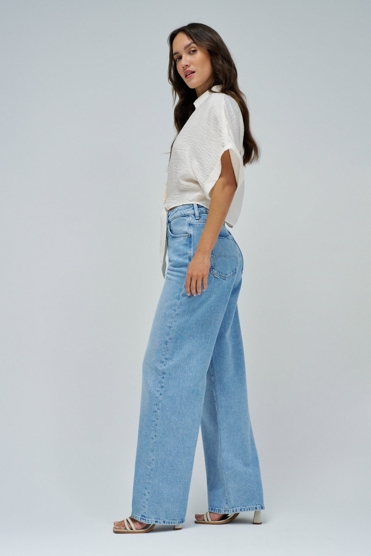 SHIRT WITH BOW AT THE HEM