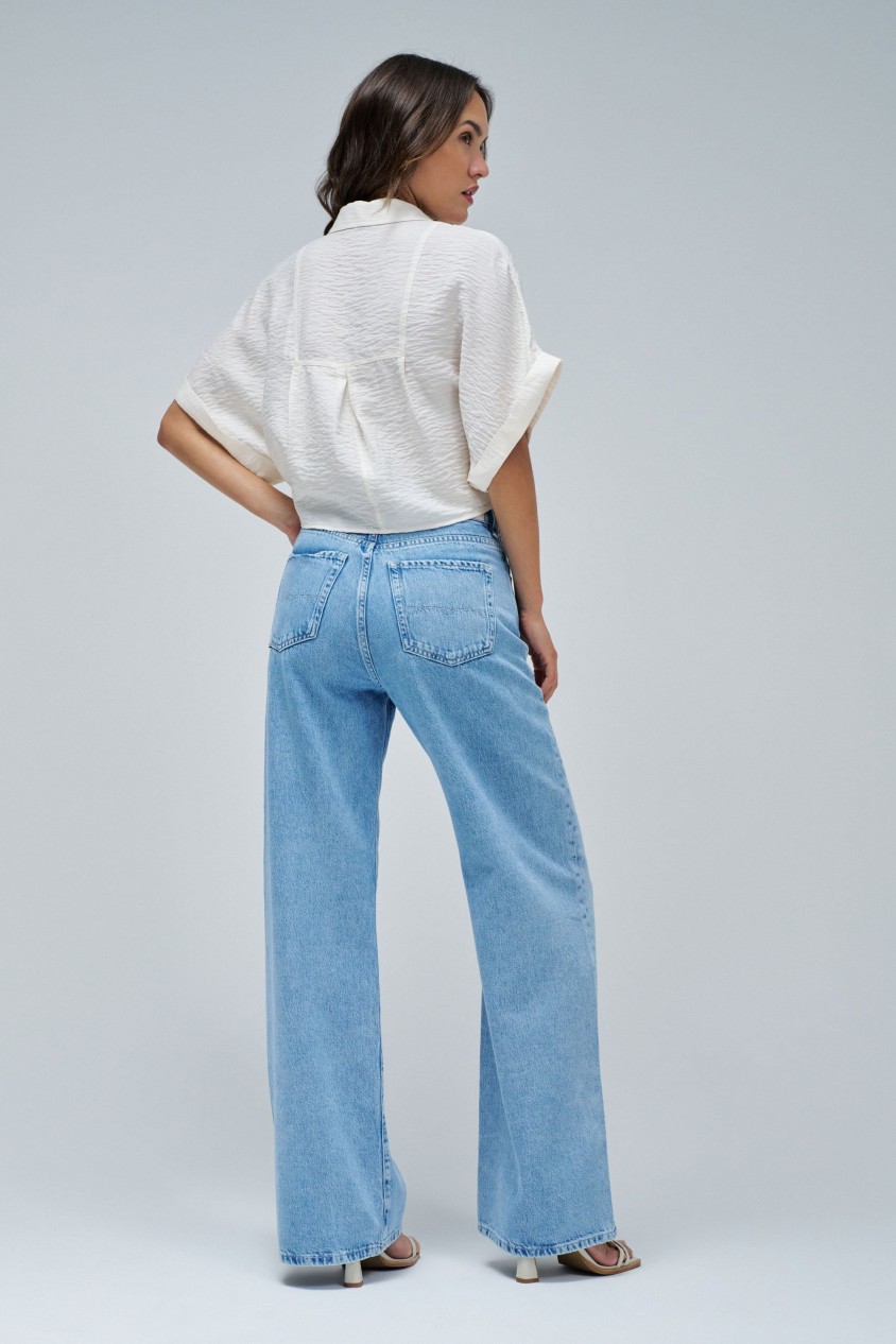 SHIRT WITH BOW AT THE HEM