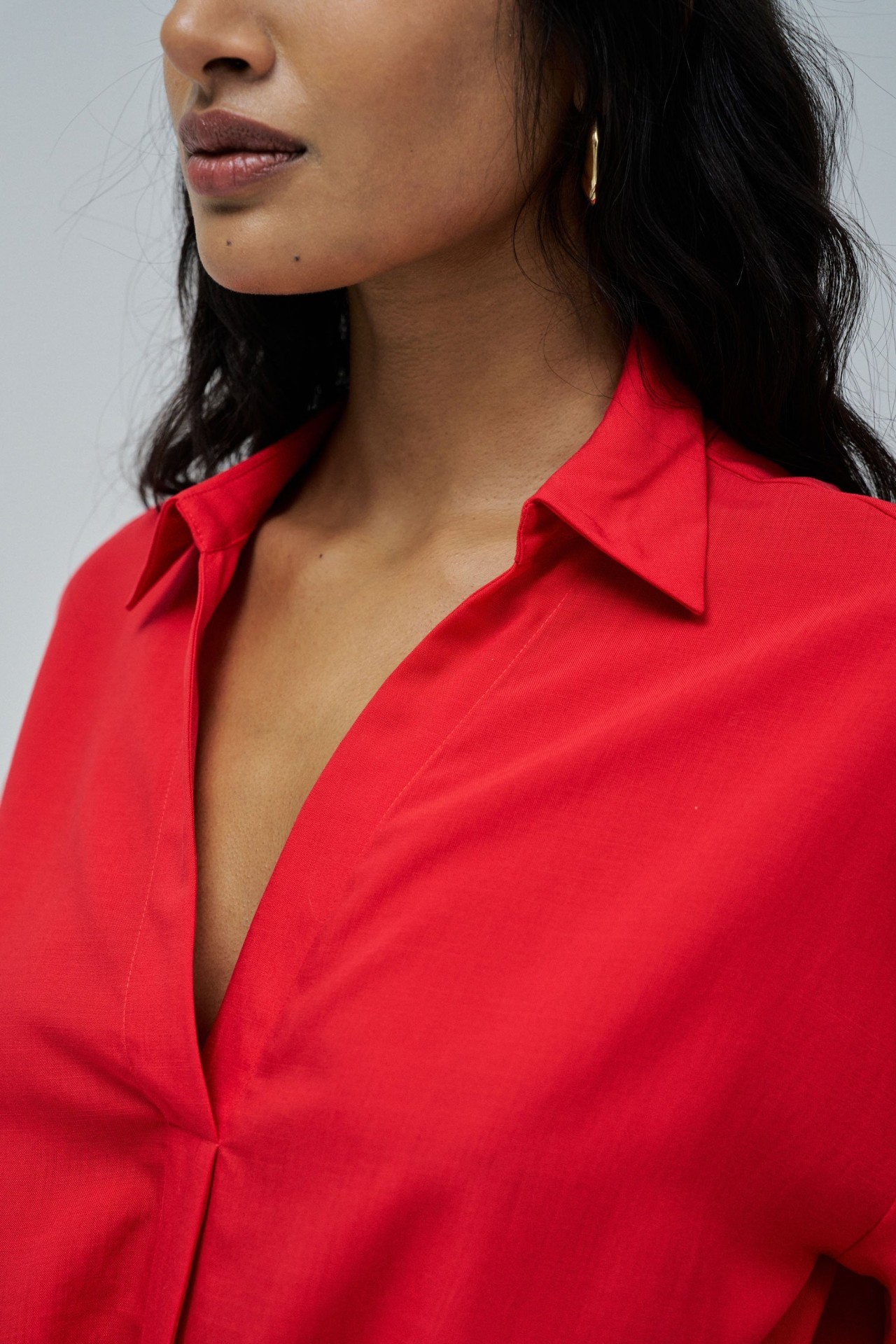 SHIRT IN LIGHTDENIM WITH BOW AT THE HEM