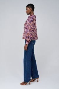 BLUSA CON VOLANTES