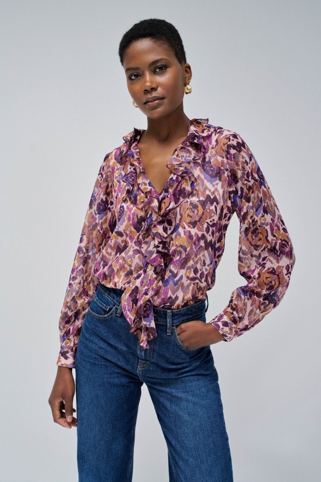 BLUSA CON VOLANTES