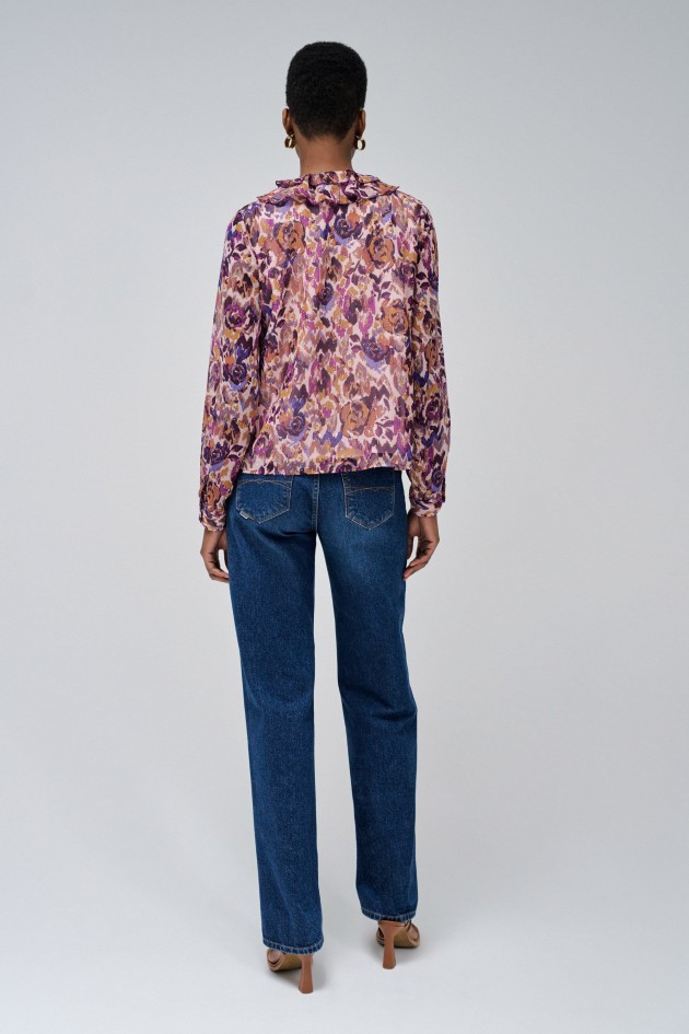 BLUSA CON VOLANTES