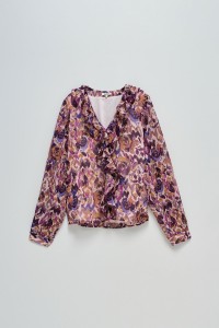 BLUSA CON VOLANTES