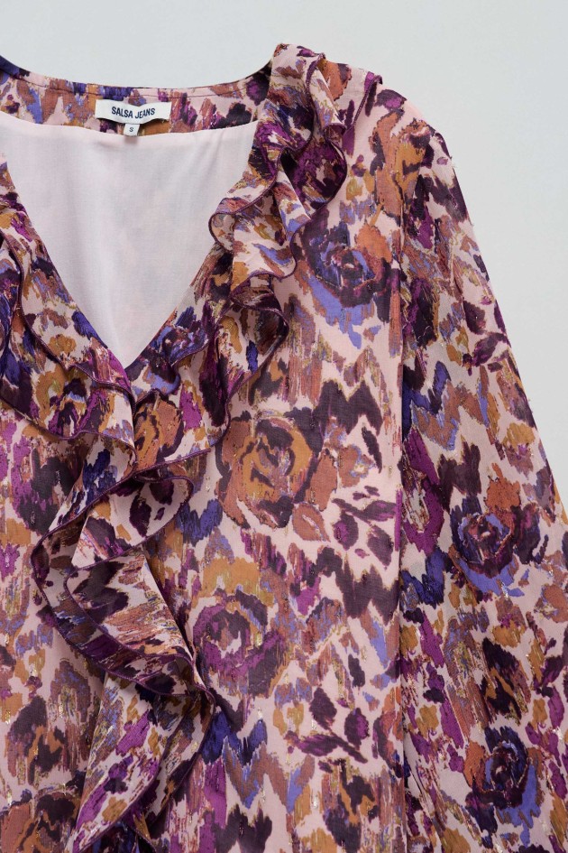 BLUSA CON VOLANTES