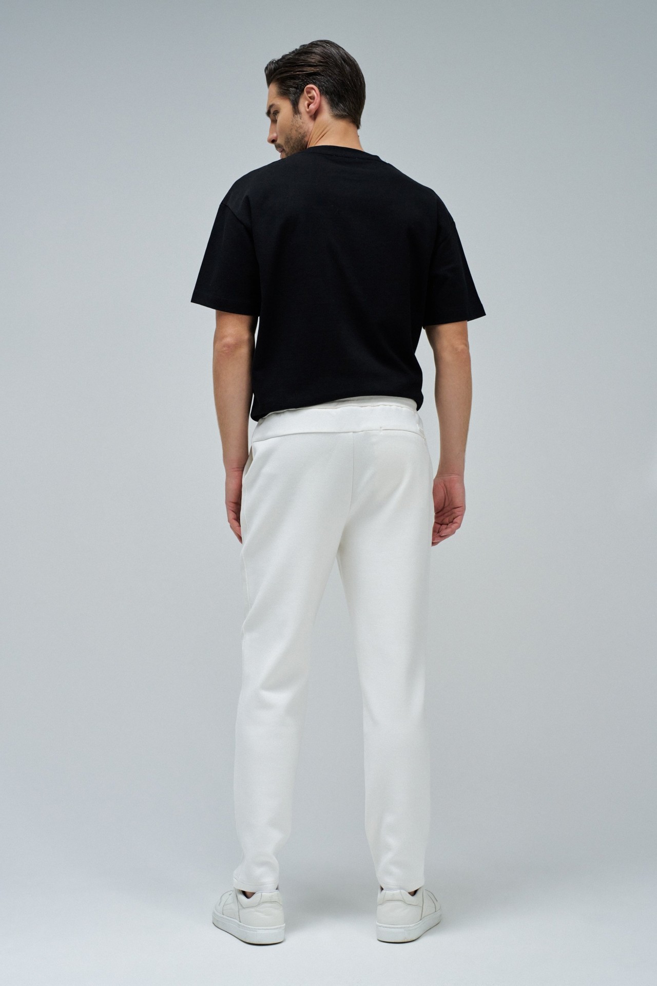 CAL�AS JOGGERS EM MALHA