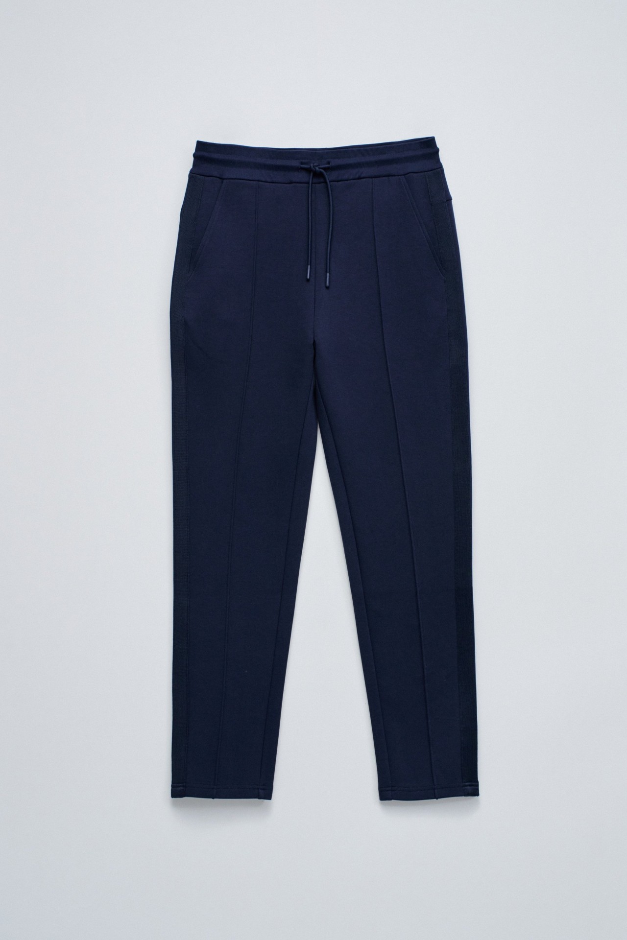 CAL�AS JOGGERS EM MALHA