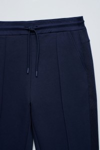CAL�AS JOGGERS EM MALHA