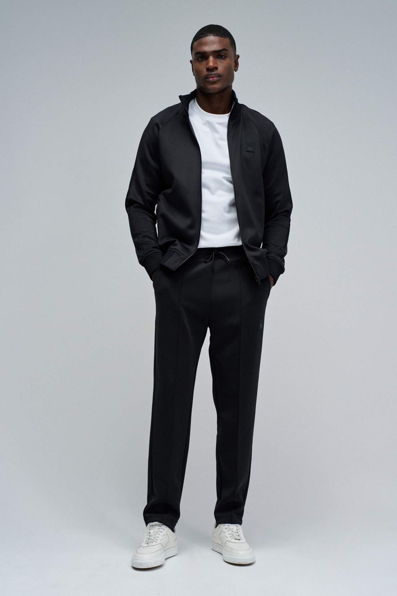 CAL�AS JOGGERS EM MALHA