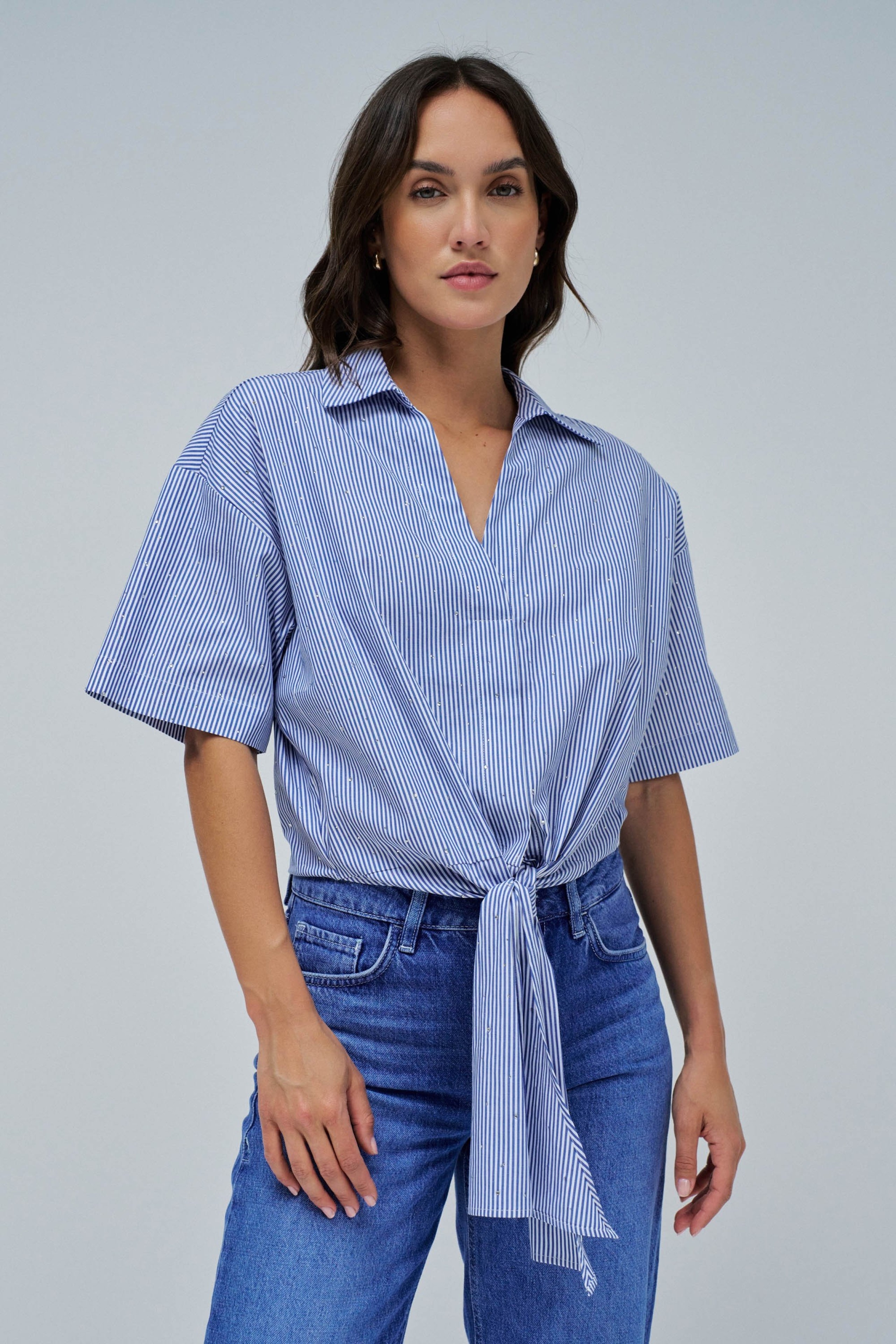 BLUSA COM LAÇO NA BAINHA