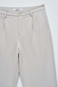 CHINO TROUSERS IN KNITTED FABRIC