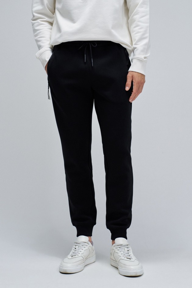 CAL�AS JOGGERS EM MALHA