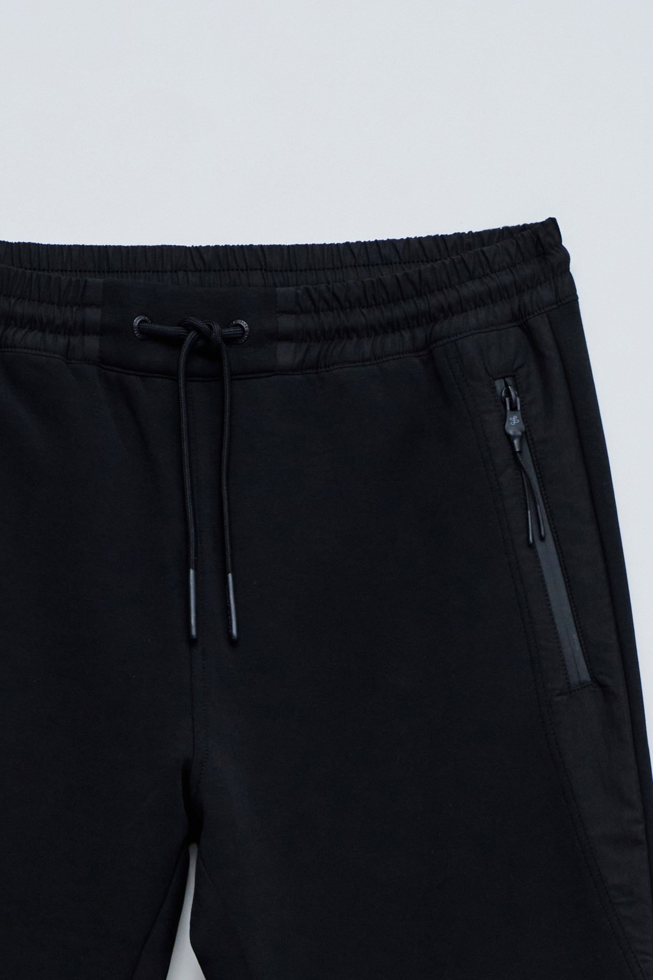 CAL�AS JOGGERS EM MALHA