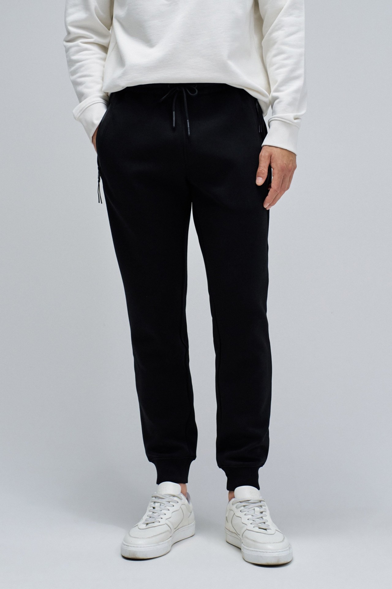 CAL�AS JOGGERS EM MALHA