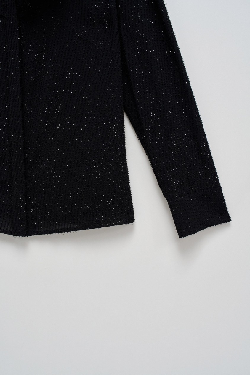BLUSE MIT VOLANTS