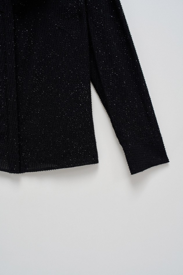 BLUSE MIT VOLANTS