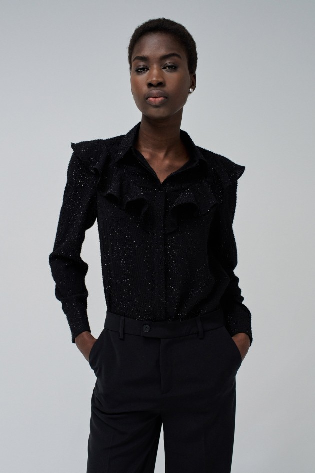 BLUSE MIT VOLANTS