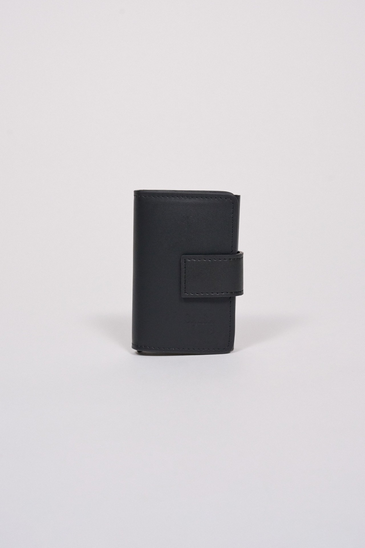 PORTA-MOEDAS R�GIDO EM PELE
