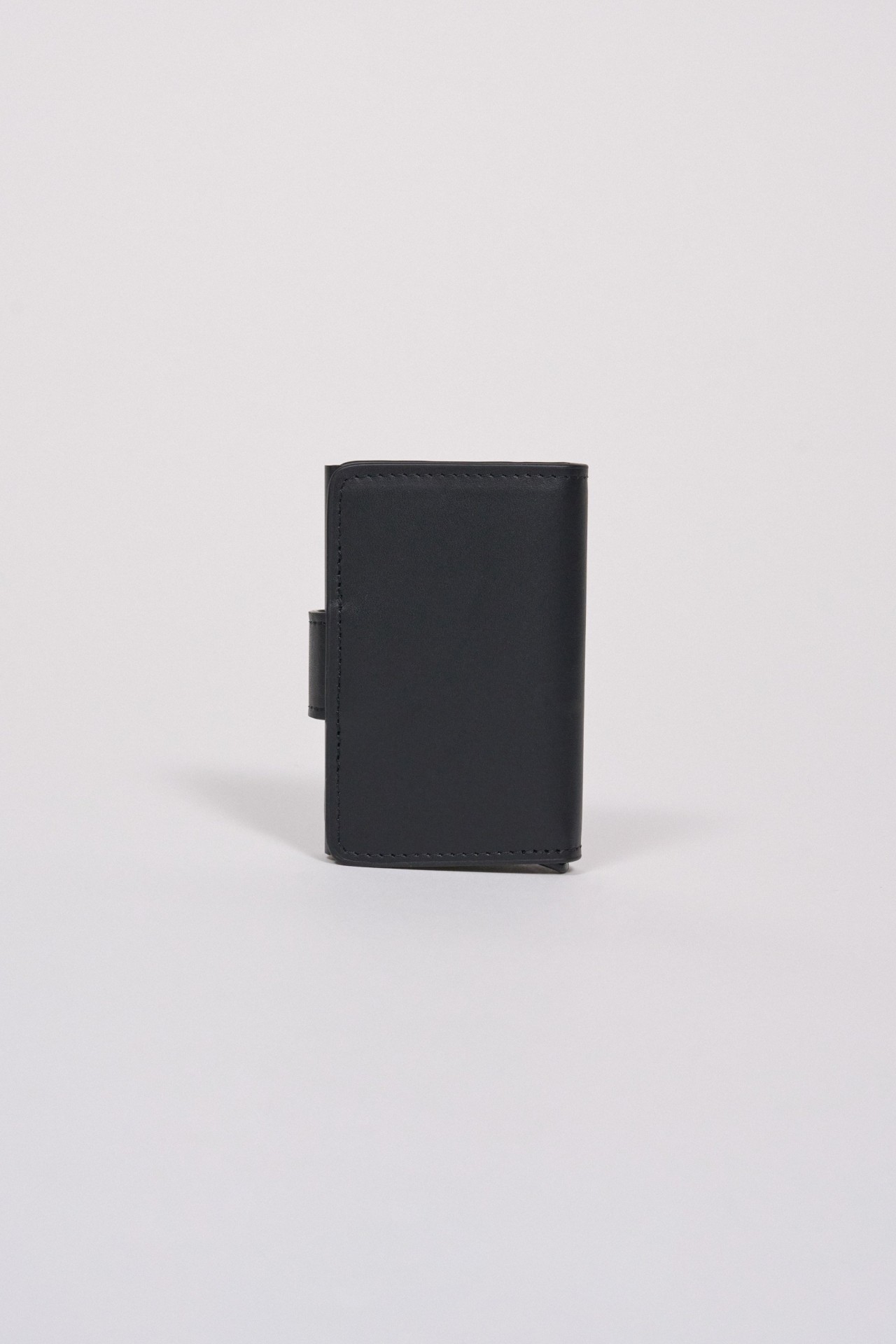 PORTA-MOEDAS R�GIDO EM PELE