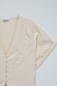 BLUSA EM LIGHTDENIM COM LA�O NA BAINHA