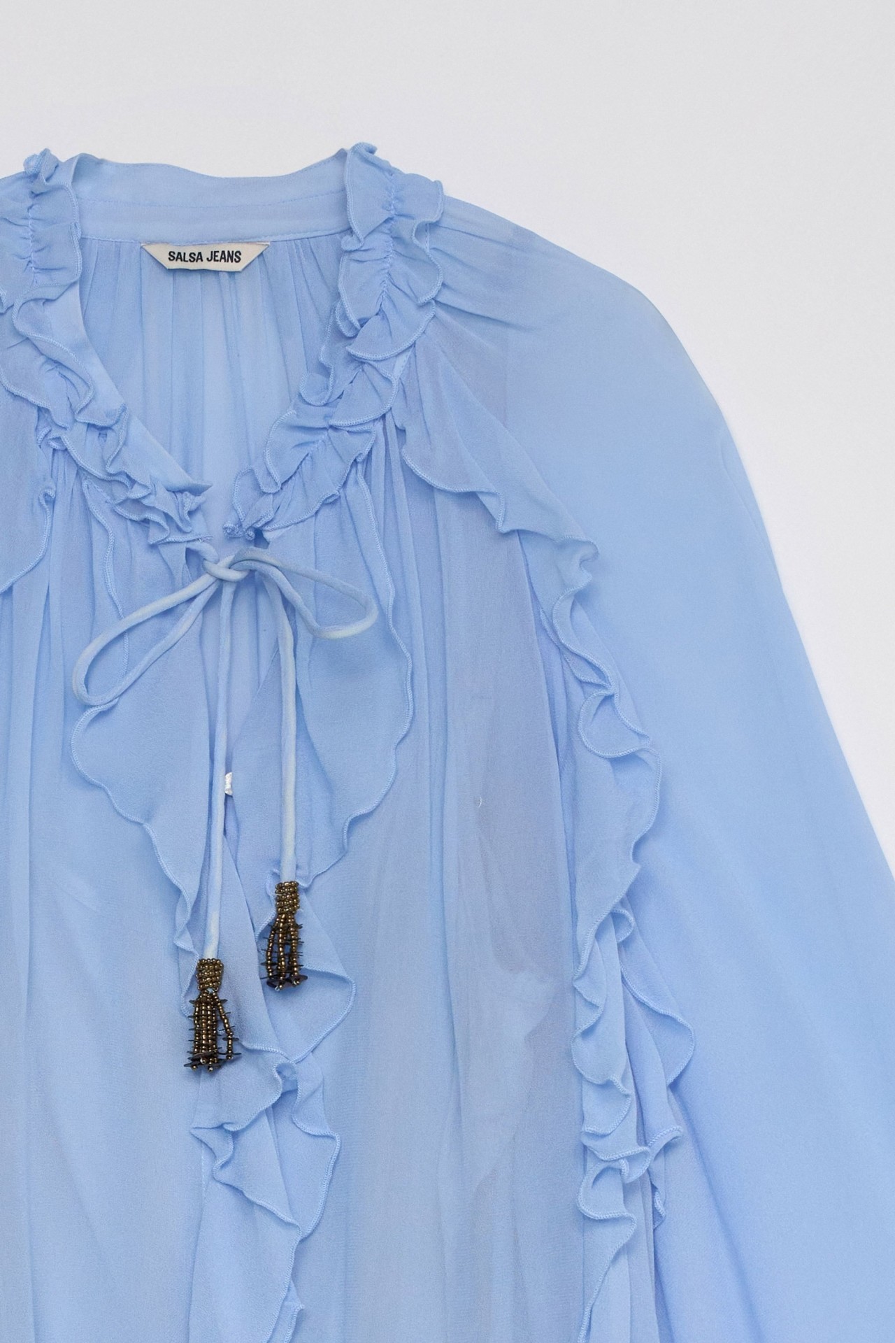 BLOUSE MET RUCHES